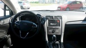 Ford patented a folding steering wheel with a laptop stand