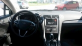 Ford patented a folding steering wheel with a laptop stand